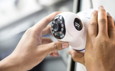 Technician fitting a CCTV camera
